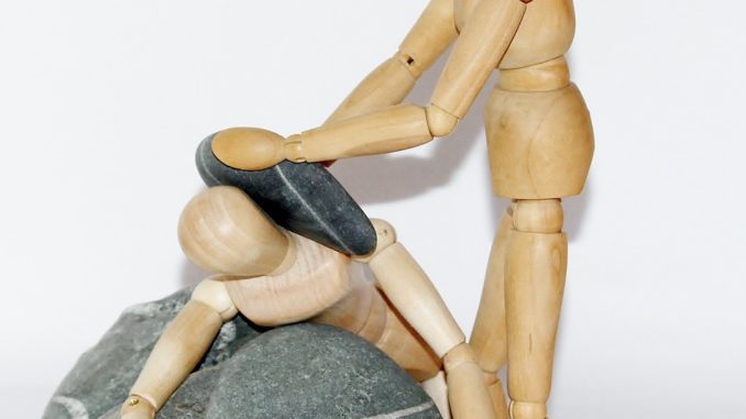 wooden figures, stones, plunge